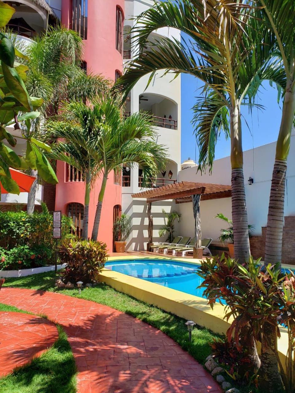 Hotel Y Suites Los Encantos ซายูลิตา ภายนอก รูปภาพ