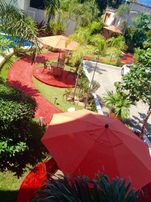Hotel Y Suites Los Encantos ซายูลิตา ภายนอก รูปภาพ