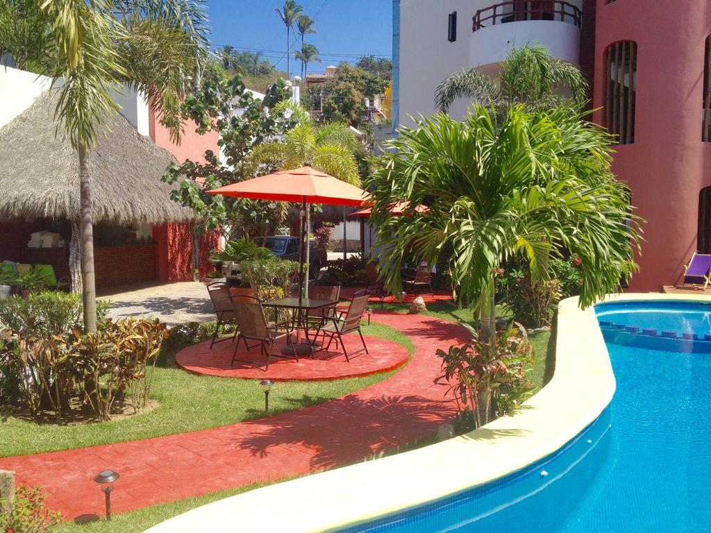 Hotel Y Suites Los Encantos ซายูลิตา ภายนอก รูปภาพ