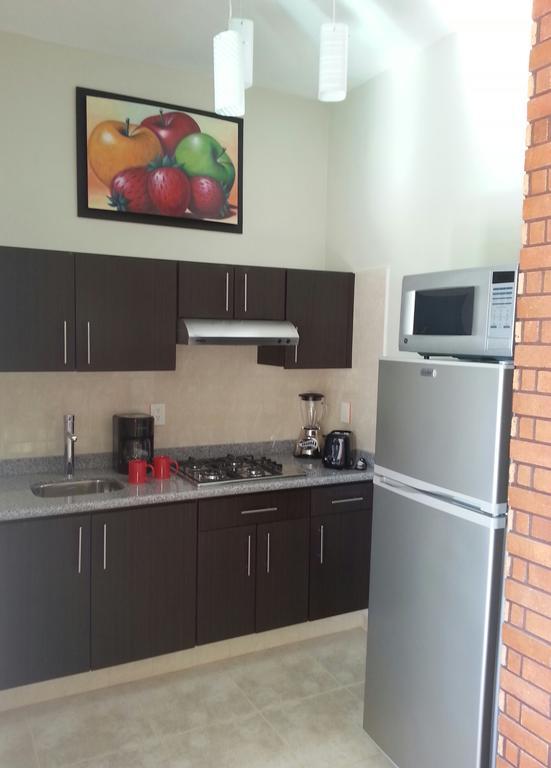 Hotel Y Suites Los Encantos ซายูลิตา ห้อง รูปภาพ